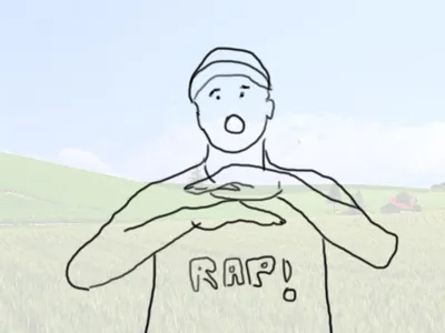 El rapero de gorra con la palabra RAP en la remera, ahora en el campo.